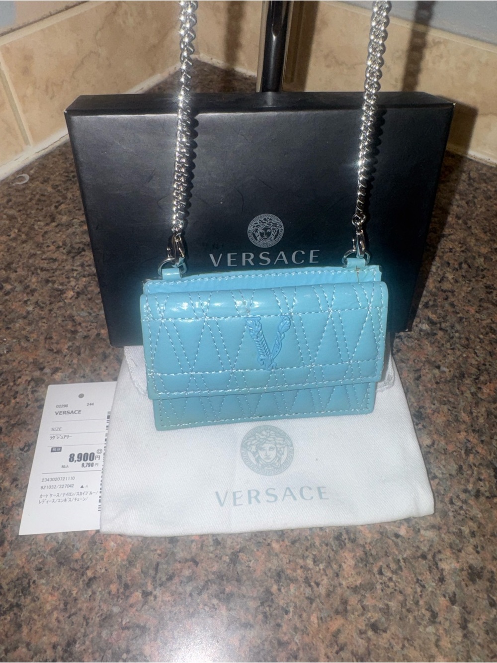 Versace Sky Blue Quilted card holder on crossbody chain full inclusion.